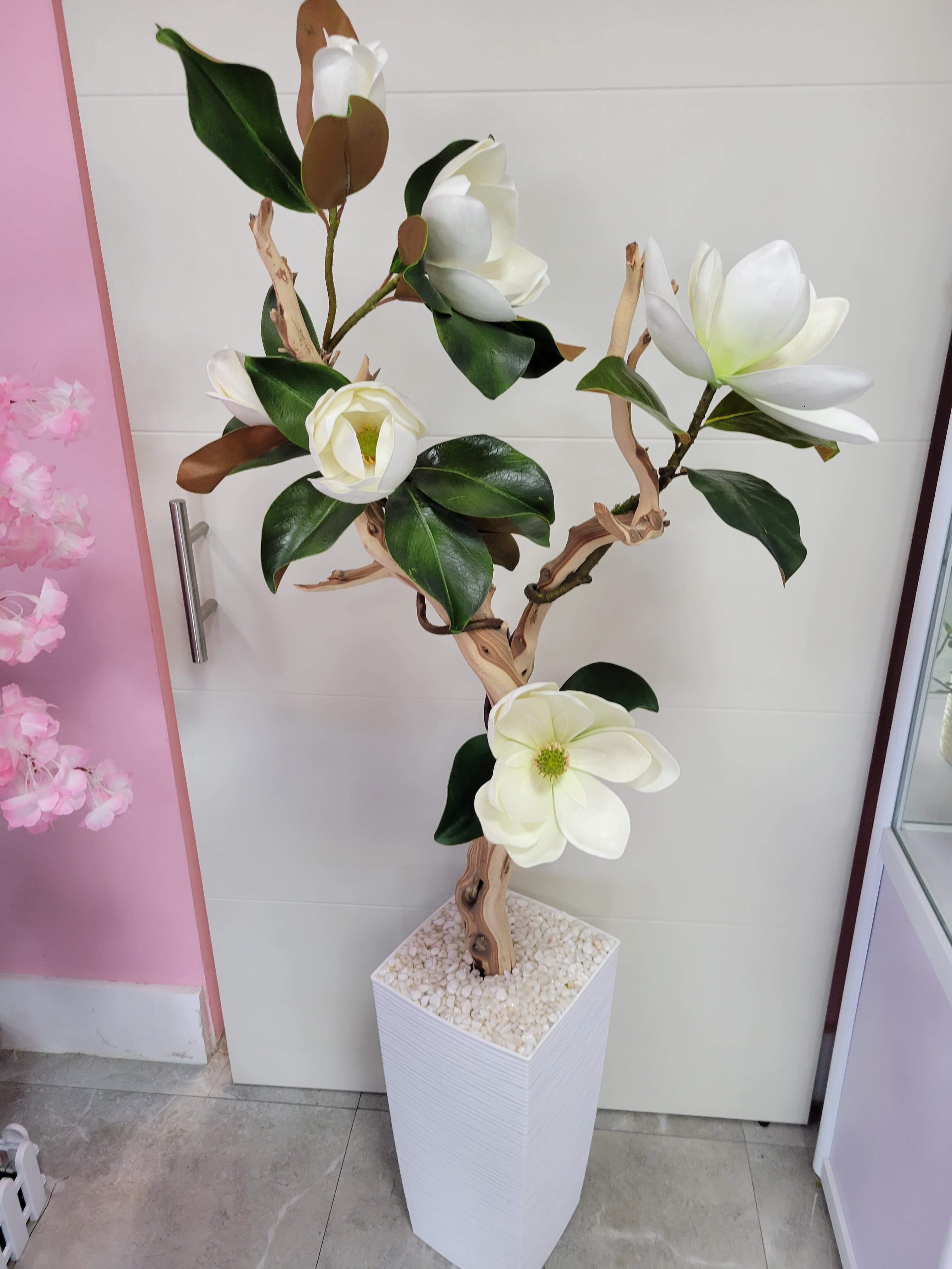 Silk Magnolias with  wooden trunk in Base.