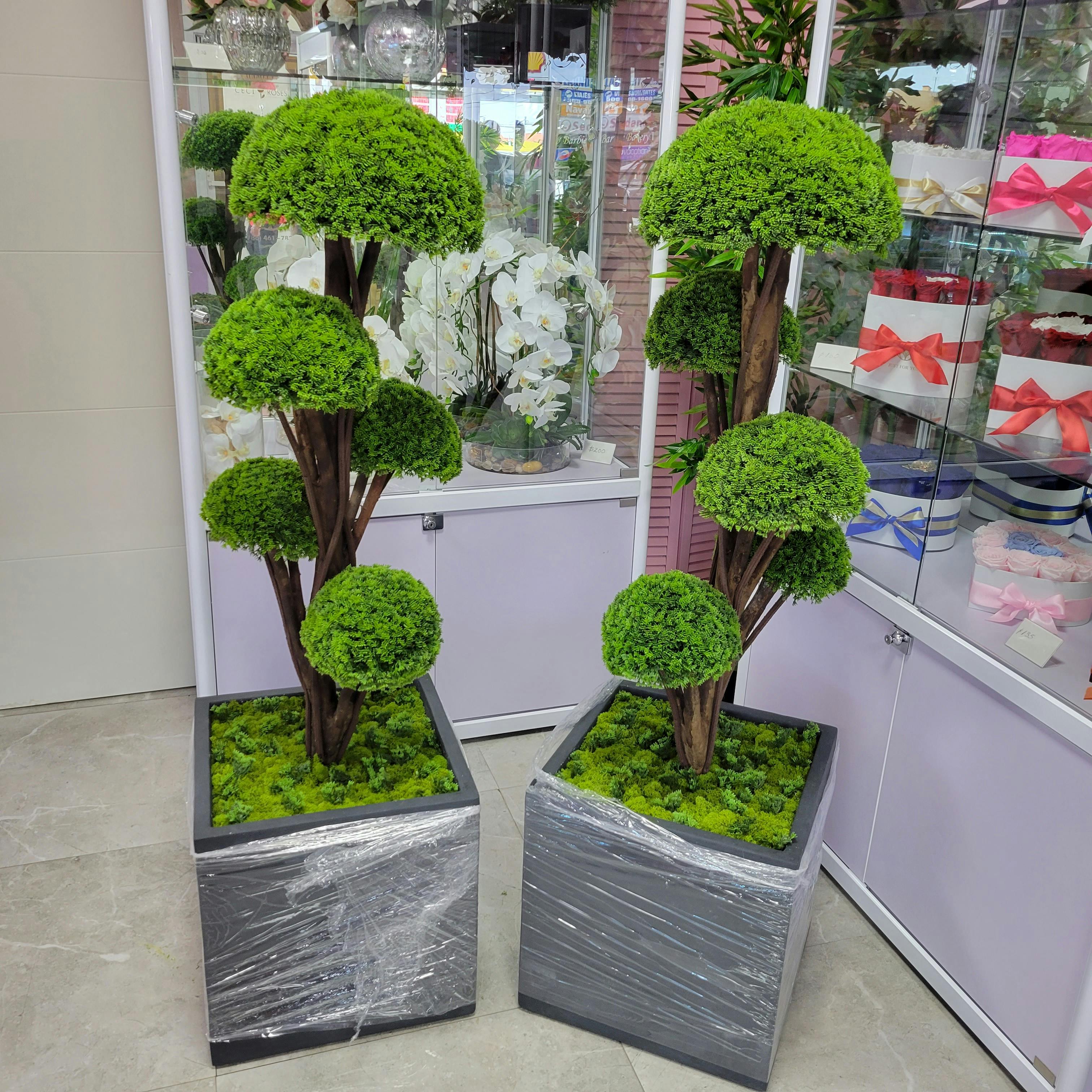 Artificial topiary tree in Pot